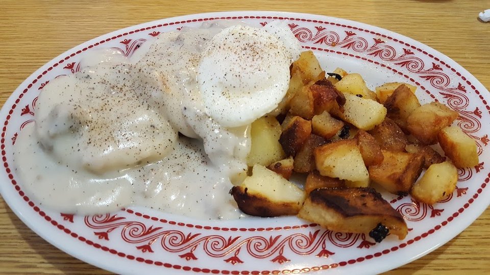 Breakfast menu with coffee and pancakes