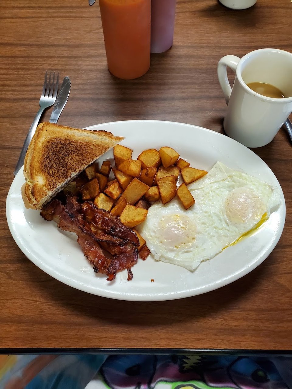 Breakfast menu with coffee and pancakes